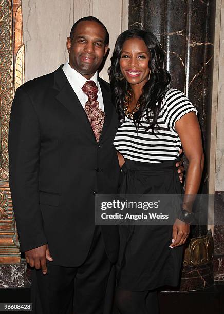 Actress Tasha Smith and guest attend the opening night of 'The Color Purple' at the Pantages Theatre on February 11, 2010 in Hollywood, California.