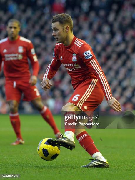 Fabio Aurelio of Liverpool in action during the Barclays Premier League match between Liverpool and Wigan Athletic at Anfield on February 12, 2011 in...