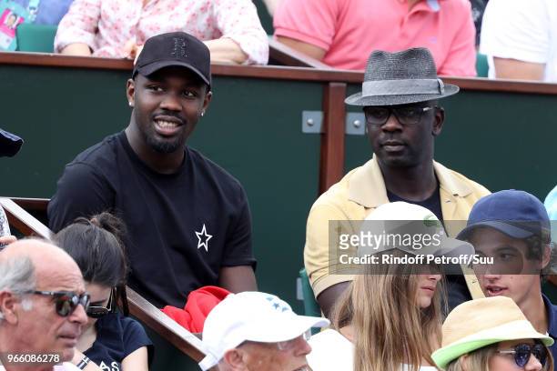Footballers Lilian and his son Marcus Thuram attend the 2018 French Open - Day Seven at Roland Garros on June 2, 2018 in Paris, France.