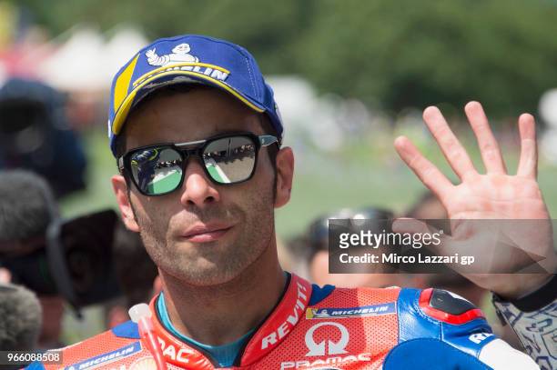Danilo Petrucci of Italy and Pramac Racing celebrates the Indiependent team pole position at the end of the qualifying practice during the MotoGp of...