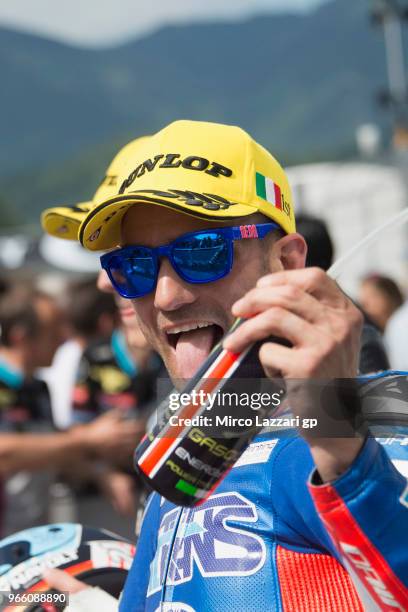 Mattia Pasini of Italy and Italtrans Racing celebrates the Moto2 pole position at the end of the qualifying practice during the MotoGp of Italy -...