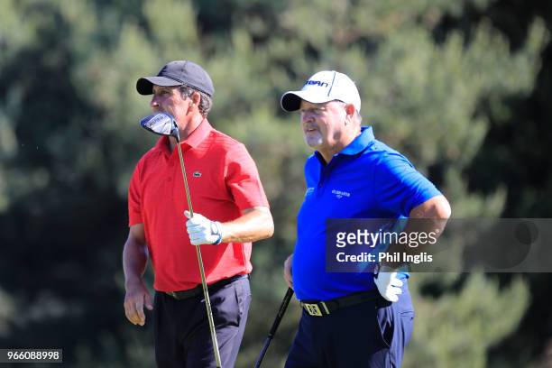 Ian Woosnam of Wales watched by Jose Maria Olazabal of Spain in action during Day Two of The Shipco Masters Promoted by Simons Golf Club at Simon's...