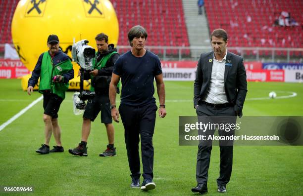 Franco Foda , head coach of Austria and Joachim loew, head coach of Germany inspecting the pitch before the International Friendly match between...