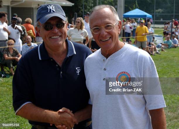 Rudolph Giuliani and Larry Brown at The 57th annual Artists and Writers Softball Game held at Herrick Park in East Hampton BRIAN ZAK.