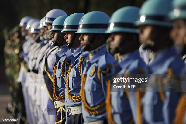 Bangladeshi military guard of honour stand in formation as they wait for Turkish President Abdullah Gul to arrive at the National Martyrs' Memorial...