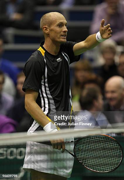 Nikolay Davydenko of Russia complains to the umpire in his match against Jurgen Melzer of Austria during day five of the ABN AMBRO World Tennis...