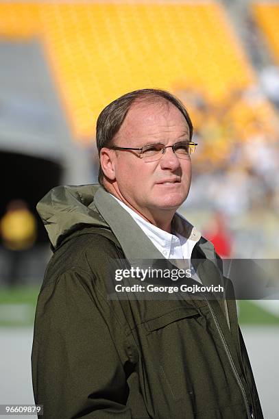 Director of Football Operations Kevin Colbert of the Pittsburgh Steelers looks on from the sideline before a college football game between the...