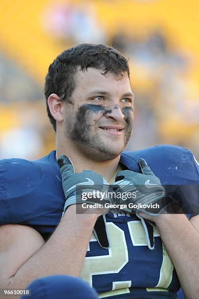 Fullback Henry Hynoski of the University of Pittsburgh Panthers looks on from the sideline during a college football game against the Syracuse...