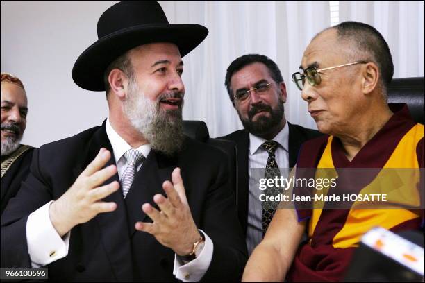 Tibetan spiritual leader, the Dalai Lama, with Israel Chief Ashkenaki rabbi Yehuda Metzger during their meeting in Jerusalem.