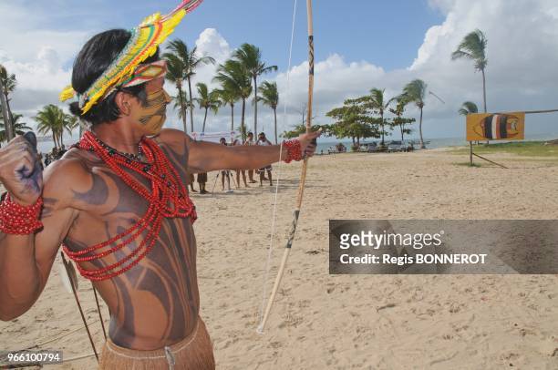 Members of the Pataxo tribe attend a the indigenous Pataxo games on April 17, 2012 at Coroa Vermelha beach, Brasil. Indigenous groups oppose Brazil?s...