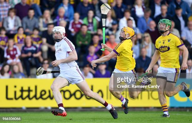 Wexford , Ireland - 2 June 2018; Joe Canning of Galway in action against Damien Reck of Wexford during the Leinster GAA Hurling Senior Championship...