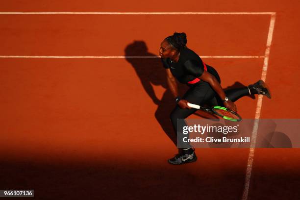 Serena Williams of The United States serves during the ladies singles third round match against Julia Georges of Germany during day seven of the 2018...