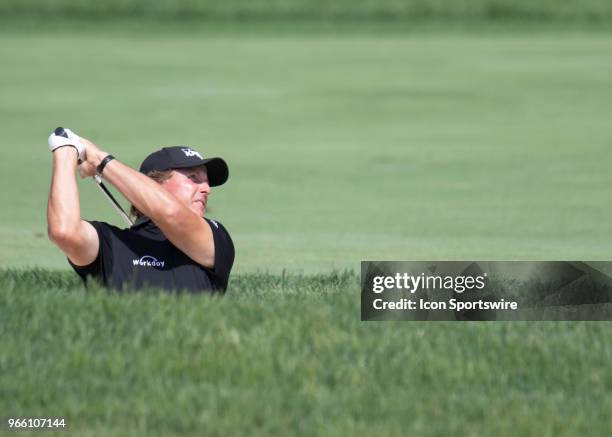 Phil Mickelson plays from a bunker during the third round of the Memorial Tournament at Muirfield Village Golf Club in Dublin, Ohio on June 02, 2018.