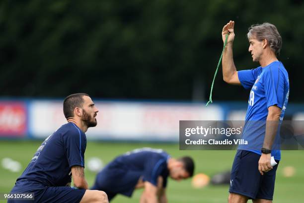 Head coach Italy Roberto Mancini and Leonardo Bonucci chat during a Italy training session at Juventus Center Vinovo on June 2, 2018 in Vinovo, Italy.