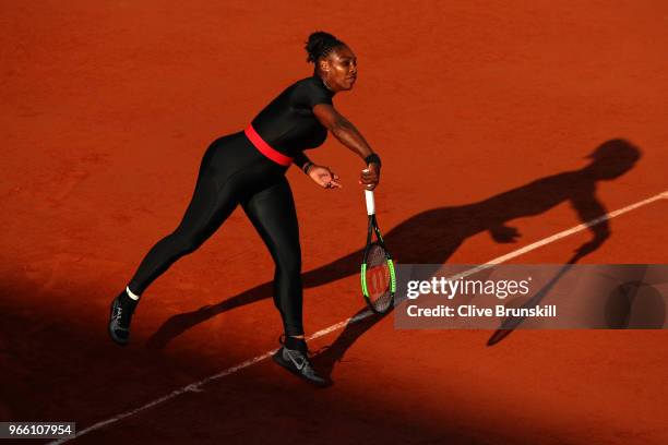 Serena Williams of The United States serves during the ladies singles third round match against Julia Georges of Germany during day seven of the 2018...
