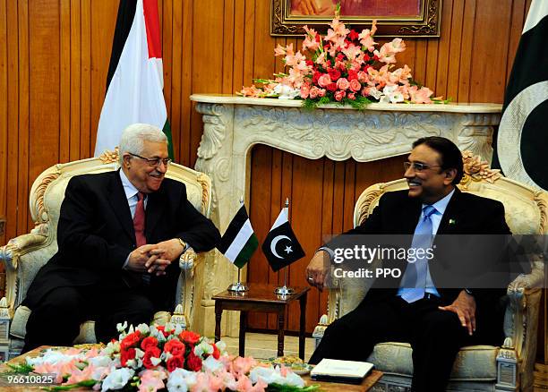 In this handout image provided by the Palestinian Press Office , Palestinian President Mahmoud Abbas meets with Pakistani President Asif Ali Zardari...