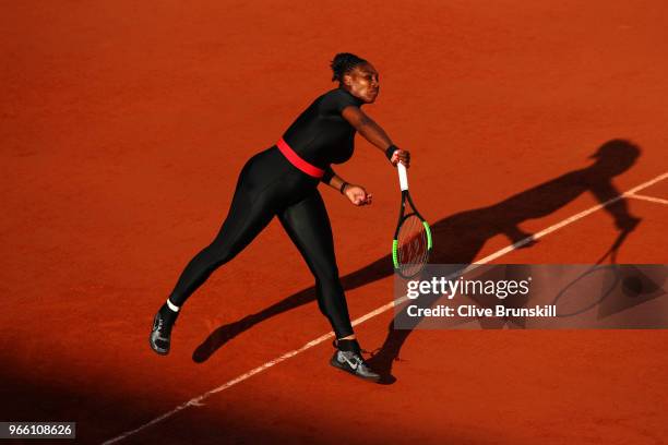 Serena Williams of The United States serves during the ladies singles third round match against Julia Georges of Germany during day seven of the 2018...