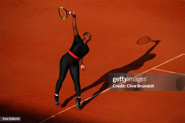 Serena Williams of The United States serves during the ladies singles third round match against Julia Georges of Germany during day seven of the 2018...