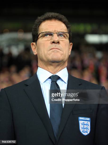England manager Fabio Capello looks on during the international friendly match between Denmark and England at Parken Stadium on February 9, 2011 in...