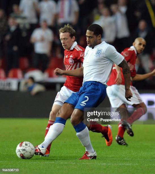 Glen Johnson of England and Michael Krohn-Dehli of Denmark battling for the ball during the international friendly match between Denmark and England...