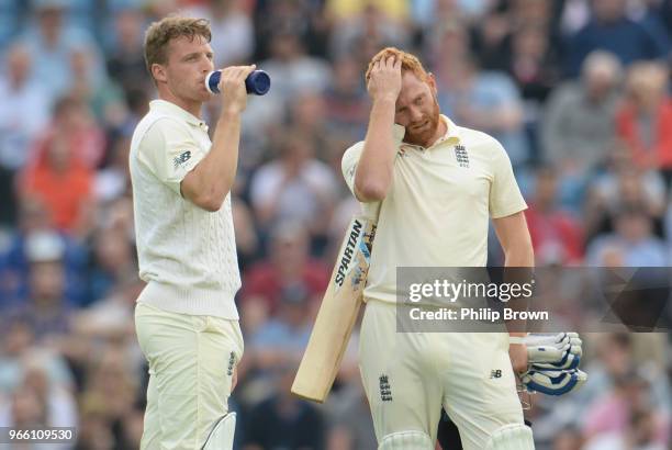 Jos Buttler and Jonny Bairstow of England take a break during the second day of the 2nd Natwest Test match between England and Pakistan at Headingley...