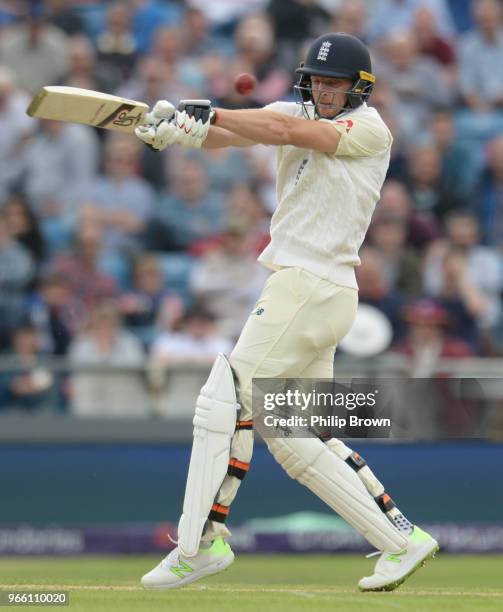 Jos Buttler of England is hit by a bouncer during the second day of the 2nd Natwest Test match between England and Pakistan at Headingley cricket...