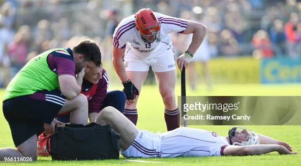 Wexford , Ireland - 2 June 2018; Joe Canning of Galway is treated for an injury as teammate Conor Whelan looks on during the Leinster GAA Hurling...