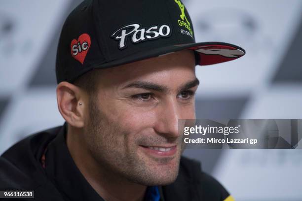 Mattia Pasini of Italy and Italtrans Racing smiles during the press conference at the end of the qualifying practice during the MotoGp of Italy -...
