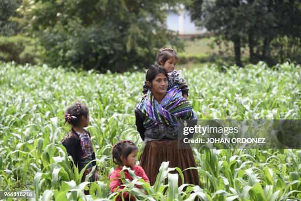 Indigenous people gather in the village of Los Mendoza, San Juan Ostuncalco municipality, Quetzaltenango department, 115 km west of Guatemala City,...