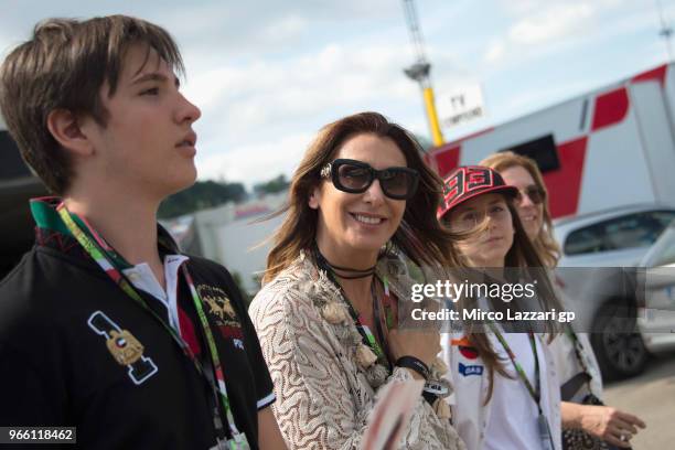 Sabrina Salerno of Italy smiles in paddock at the end of the qualifying practice during the MotoGp of Italy - Qualifying at Mugello Circuit on June...