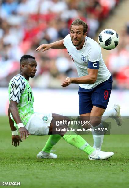 Ogenyi Onazi of Nigeria and Harry Kane of England during the International Friendly between England and Nigeria at Wembley Stadium on June 2, 2018 in...