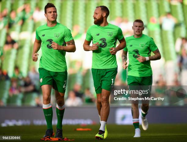 Dublin , Ireland - 2 June 2018; Republic of Ireland players, from left, Kevin Long, David Meyler, and James McClean warm up prior to the...