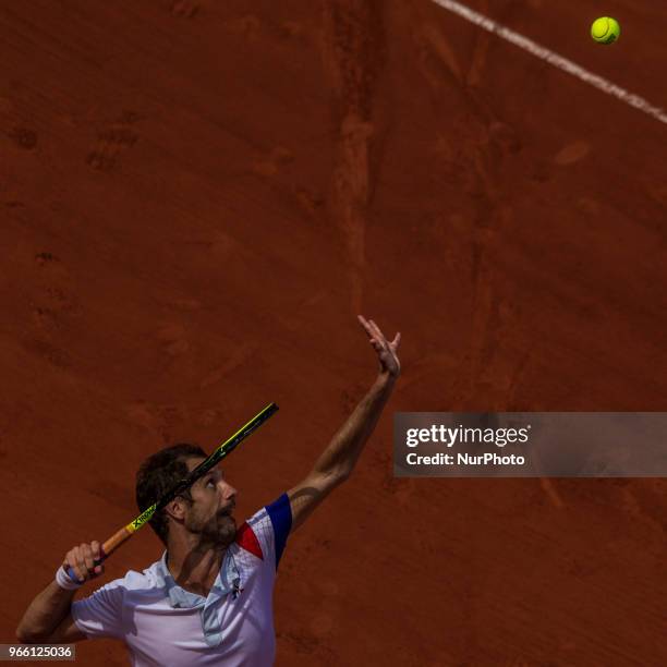 Richard Gasquet of France serves against Rafael Nadal of Spain during the third round at Roland Garros Grand Slam Tournament - Day 7 on June 02, 2018...