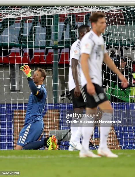 Manuel Neuer, goalkeeper of Germany reacts after he gets the 2nd goal during the International Friendly match between Austria and Germany at...