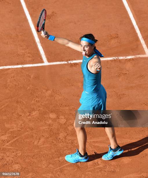 Caroline Garcia of France celebrates after her victory against Irina-Camelia Begu of Romania during their third round match at the French Open tennis...