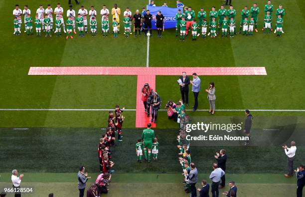 Dublin , Ireland - 2 June 2018; John O'Shea of Republic of Ireland makes his way onto the pitch with his daughter Ruby and son Alfie prior to the...