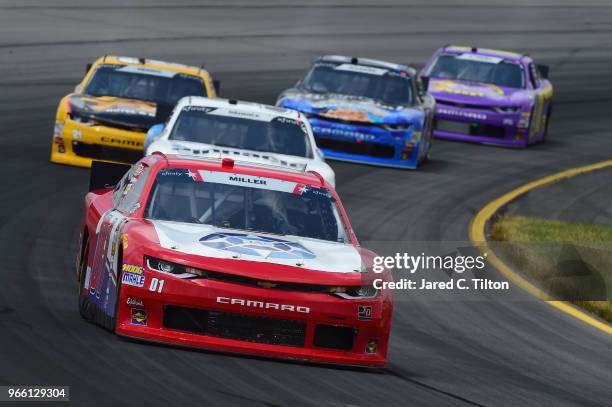 Vinnie Miller, driver of the JAS Trucking Chevrolet, leads a pack of cars during the NASCAR Xfinity Series Pocono Green 250 Recycled by J.P. Mascaro...