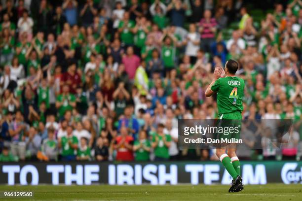 John O'Shea of the Republic of Ireland applauds fans as he is substituted off for the final time during the International Friendly match between the...