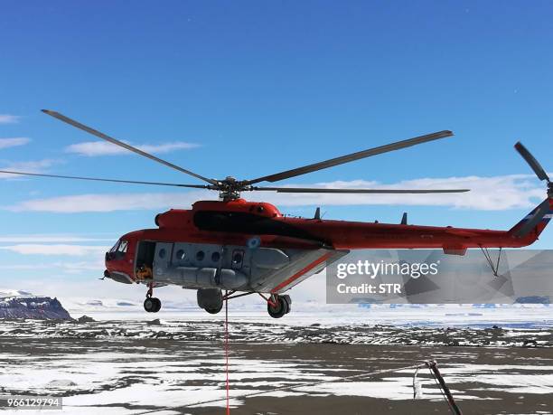 This undated file picture released by Noticias Argentinas on June 2, 2018 shows the Mi-171 E helicopter that made an emergency landing Friday in the...
