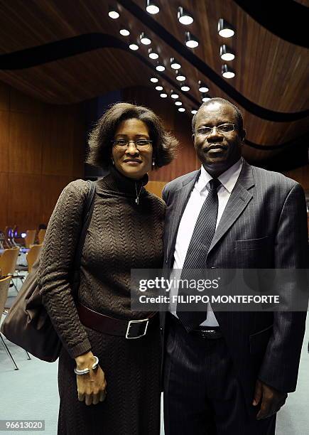 Counselor and Chief of Staff to the Secretary of State Cheryl Mills poses with Haitian agriculture minister Joanas Gue during a meeting for...