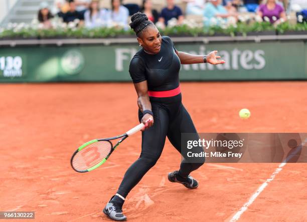 Serena Williams of the United States hits a forehand to Julia Goerges of Germany in the third round of the women's singles during the French Open at...