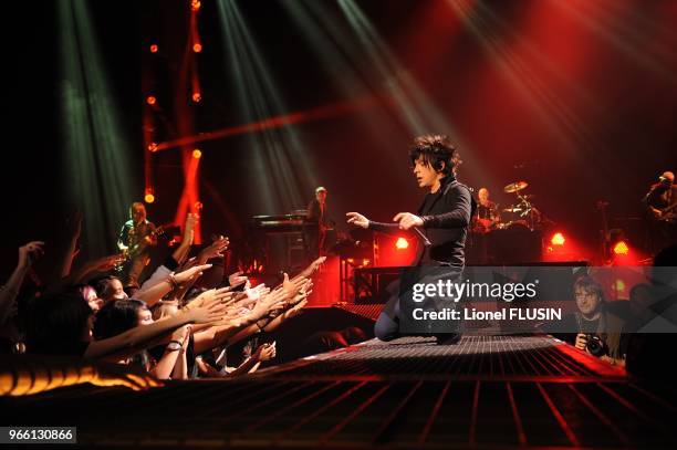 Indochine performs live.