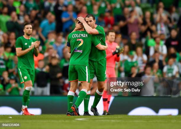 Dublin , Ireland - 2 June 2018; John O'Shea of Republic of Ireland embraces Seamus Coleman before being substituted during the International Friendly...