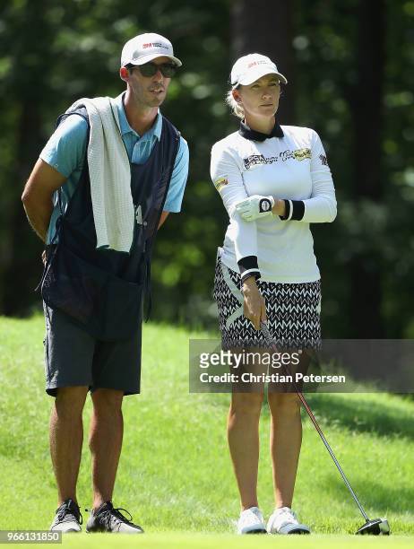 Sarah Jane Smith of Australia talks with caddie/husband Duane Smith at the second tee during the third round of the 2018 U.S. Women's Open at Shoal...