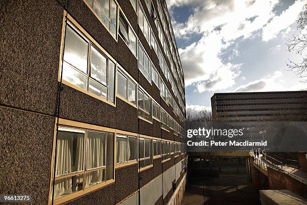 Two men cross a raised walkway on the Heygate housing estate near Elephant and Castle on February 11, 2010 in London, England. The Heygate estate...