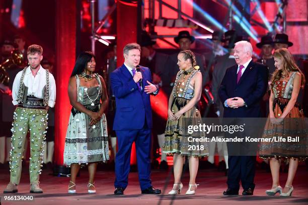 Markus Freistaetter, Rose Alaba, Viennese mayor Michael Ludwig, Missy May, former Viennese mayor Michael Haeupl and Zoe Straub are seen on stage...