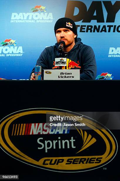 Brian Vickers, driver of the Red Bull Toyota, speaks to the media during a press conference at Daytona International Speedway on February 12, 2010 in...