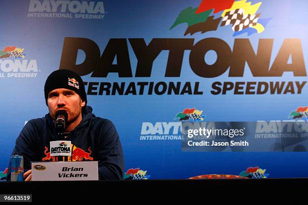 Brian Vickers, driver of the Red Bull Toyota, speaks to the media during a press conference at Daytona International Speedway on February 12, 2010 in...