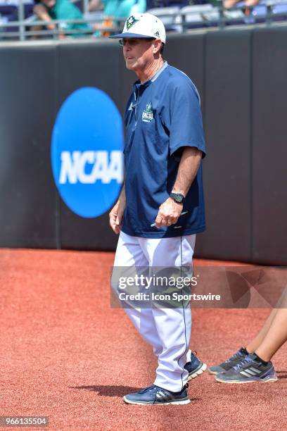 Wilmington head coach Mark Scarf waits by the dug out during the NCAA Baseball Greenville Regional between the Ohio State Buckeyes and the UNC...