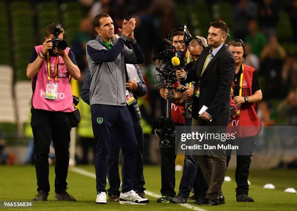 John O'Shea of the Republic of Ireland applauds fans after his final game during the International Friendly match between the Republic of Ireland and...